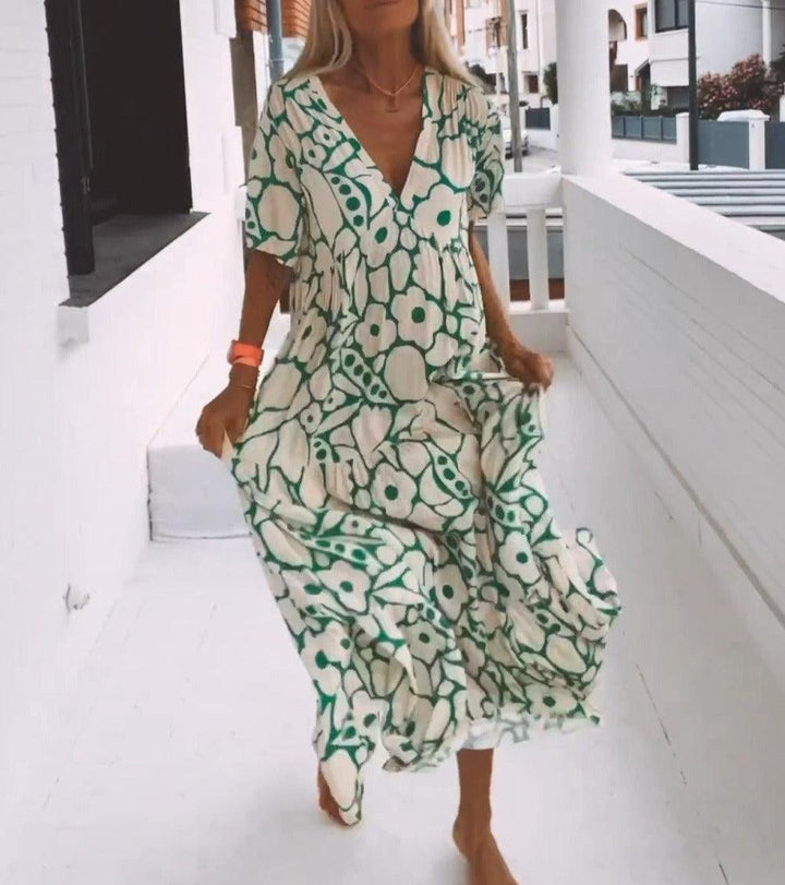 Grünes Maxikleid mit kurzen Ärmeln und Druck – Elisa