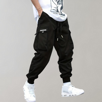Schwarze Cargohose für Herren, lässig, mit Taschen, Baumwolle, Streetwear-Mode.