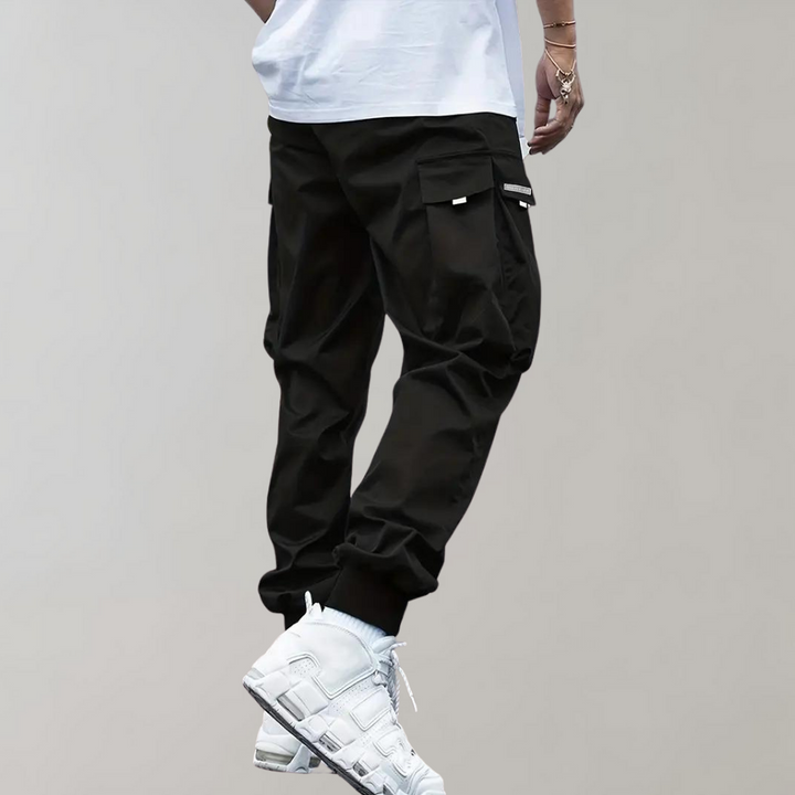 Schwarze Cargo-Hose für Herren, lässig, mit Taschen, Baumwolle, Streetwear, Mode.