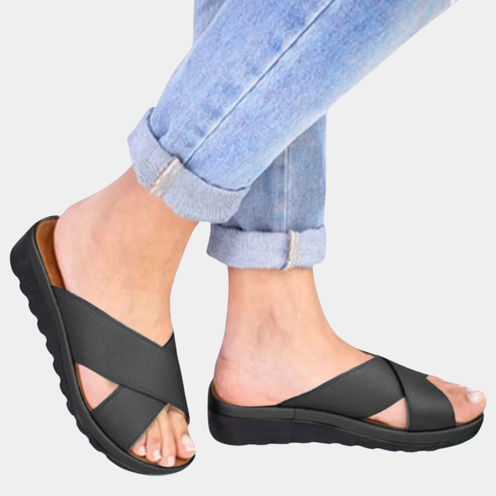 Schwarze Damen-Sandalen mit Kreuzriemen, bequeme Sohle, lässig, modisch, ideal für Sommer.