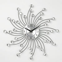 Dekorative Wanduhr Im Sonnenstrahl-Design - Solistra
