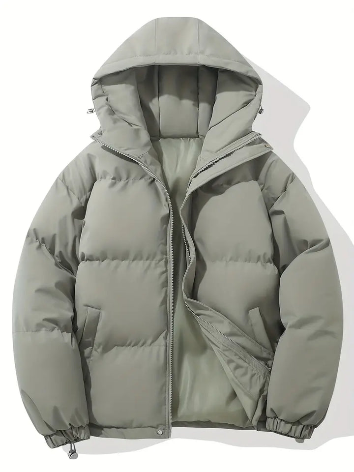 Grüne Kapuzenjacke, klassisches Design, warm, wattiert, Reißverschluss, Wintermode.