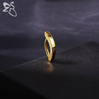 Geometrisches Bauchnabelpiercing - ShinePiercing