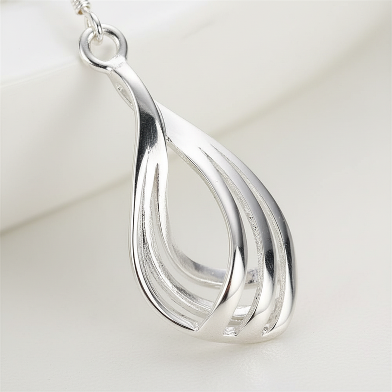 Hängende Tropfenohrringe - DropCharm