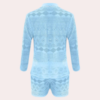 Hellblauer Spitzen-Jumpsuit, langärmlig, geometrisches Muster, modisch, Damenbekleidung.