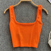 Rugloser Crop-Top in einfarbiger Farbe – Zayra