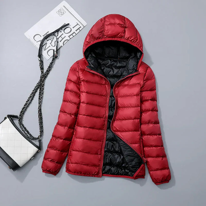 Wendbare Daunenjacke mit Kapuze – Soraya