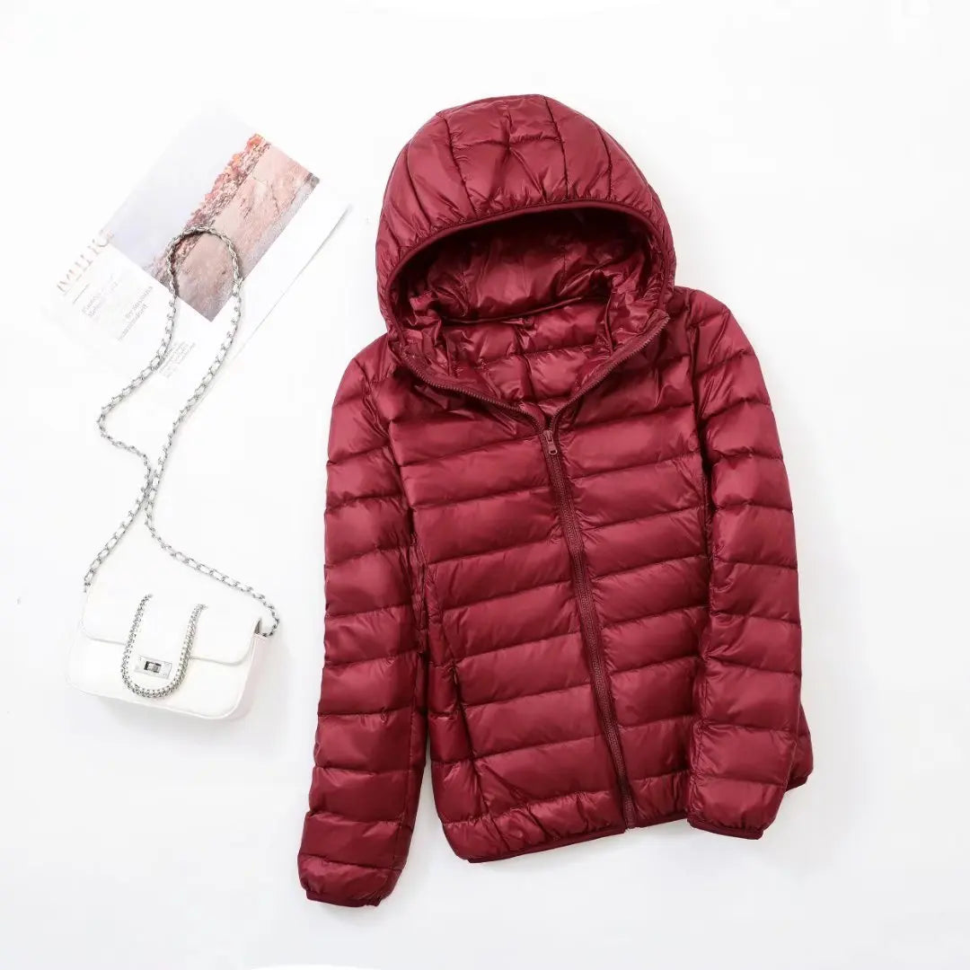 Wendbare Daunenjacke mit Kapuze – Soraya