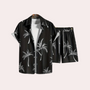 Schwarzes Hawaii-Hemd und Shorts Set mit Palmenmuster, Sommermode für Herren.