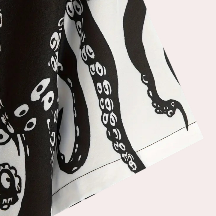 Schwarz-weißes Tintenfisch-Tentakel-Muster auf Stoff, maritimes Design, Baumwolle.