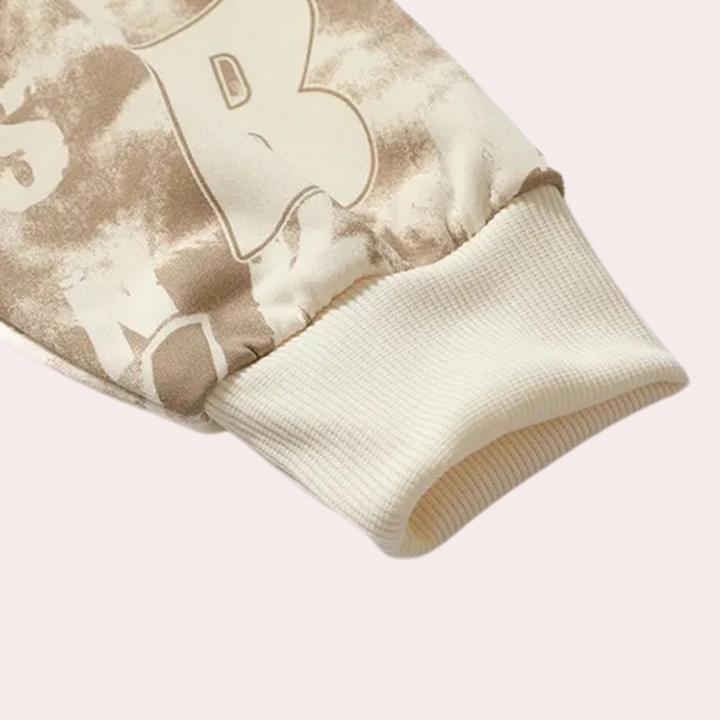 Beiger Sweatshirt-Ärmel mit Rippbündchen, Baumwolle, lässiger Stil, modisches Design.
