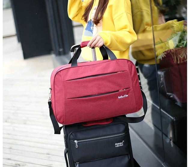 Umkehrbare Handgepäcktasche