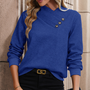 Blaue Damenbluse mit Knöpfen, elegantes Design, Herbstmode, langärmlig, strukturierter Stoff.