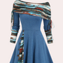 Blaues Damenkleid mit Streifenmuster, Langarm, Knopfleiste, elegantes Design.