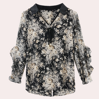 Schwarze Damenbluse mit Blumenmuster, V-Ausschnitt und langen Ärmeln, elegant und modisch.