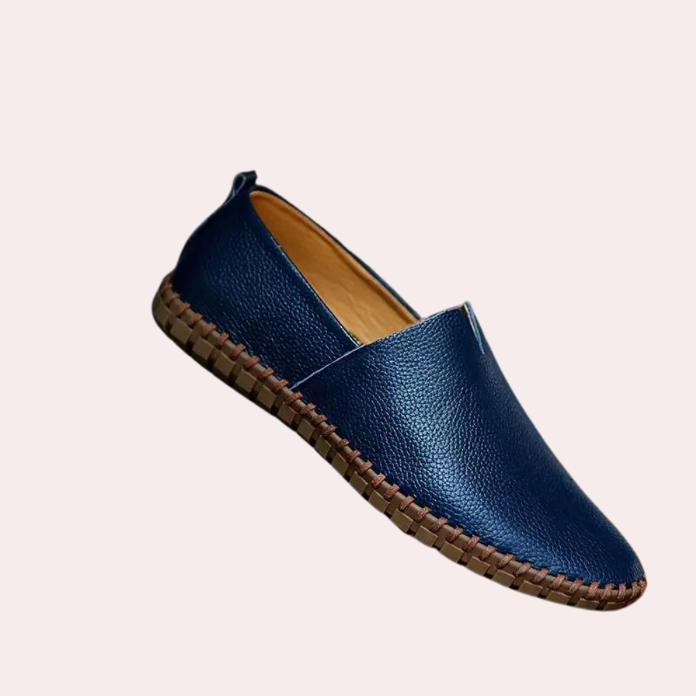 Dunkelblauer Lederschuh für Herren, handgefertigt, rutschfeste Sohle, elegantes Design.