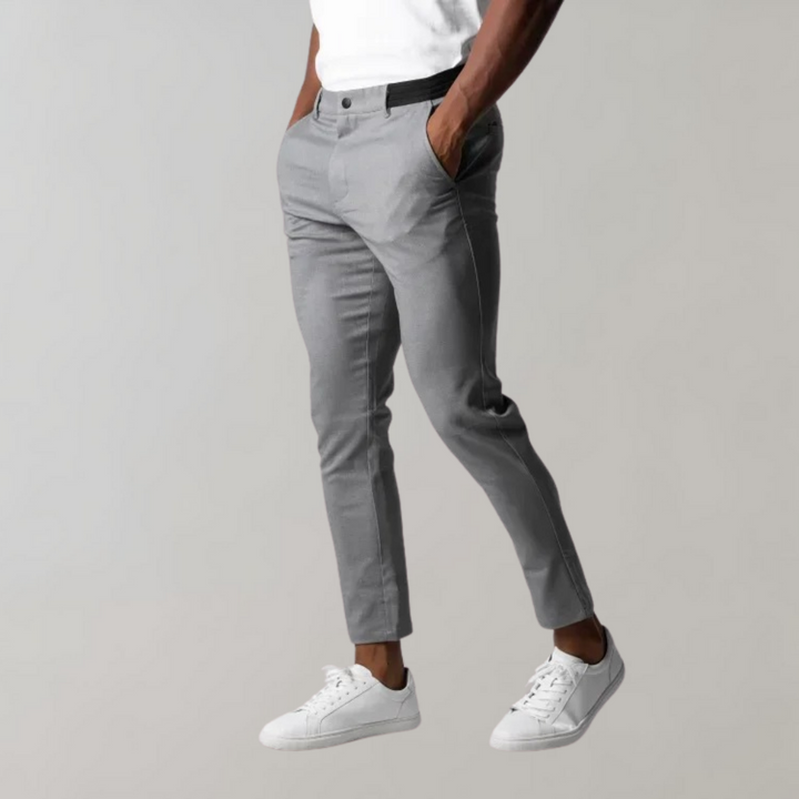 Graue Herrenhose, schmal geschnitten, aus Baumwolle, modisch, elegant, ideal für Business und Freizeit.