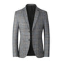 Grauer Herrenblazer kariert, Freizeitmode, eleganter Anzug, hochwertiger Stoff, stilvoll.