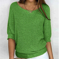 Frau in grünem Strickpullover, lässig, modisch, Damenmode, Frühlingsoutfit, Freizeitkleidung.
