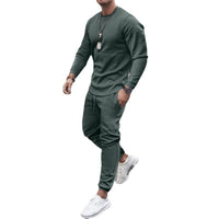 Grüner Herren Jogginganzug, langärmelig, bequem, sportlich, Freizeitkleidung.