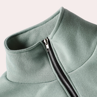 Grüner Damenpullover mit Reißverschluss, hoher Kragen, Baumwolle, modisch, bequem.