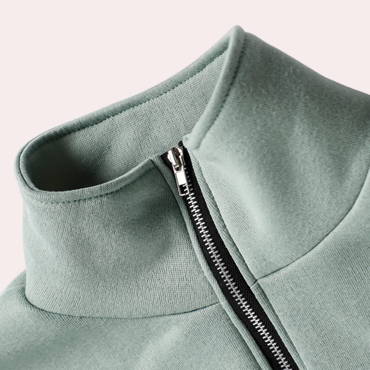 Grüner Damenpullover mit Reißverschluss, hoher Kragen, Baumwolle, modisch, bequem.