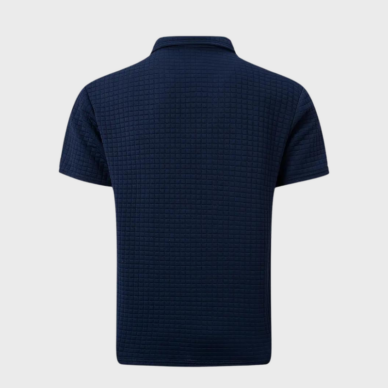 Dunkelblaues Herren-Poloshirt aus Baumwolle, kurzärmelig, strukturierter Stoff.