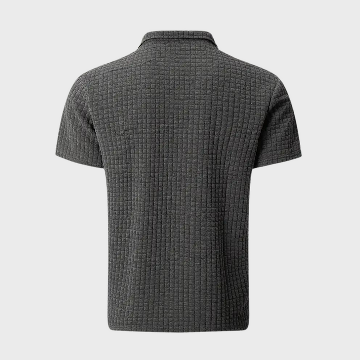 Graues Herren-Poloshirt aus Baumwolle, strukturierter Stoff, kurzärmelig, modisch.